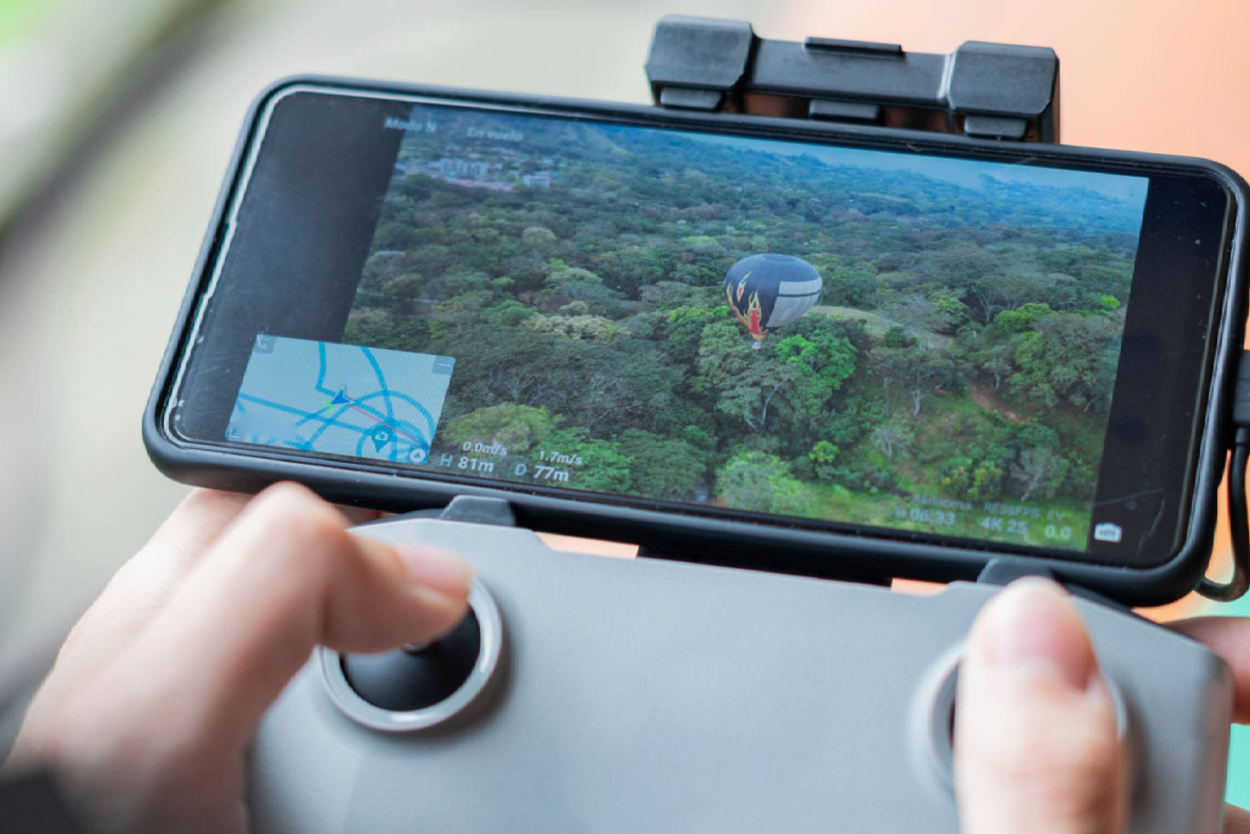Drone controller displaying hot air balloon view.